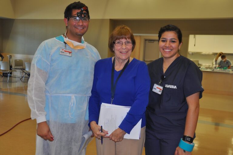 Volunteers in scrubs at an Ayuda clinic